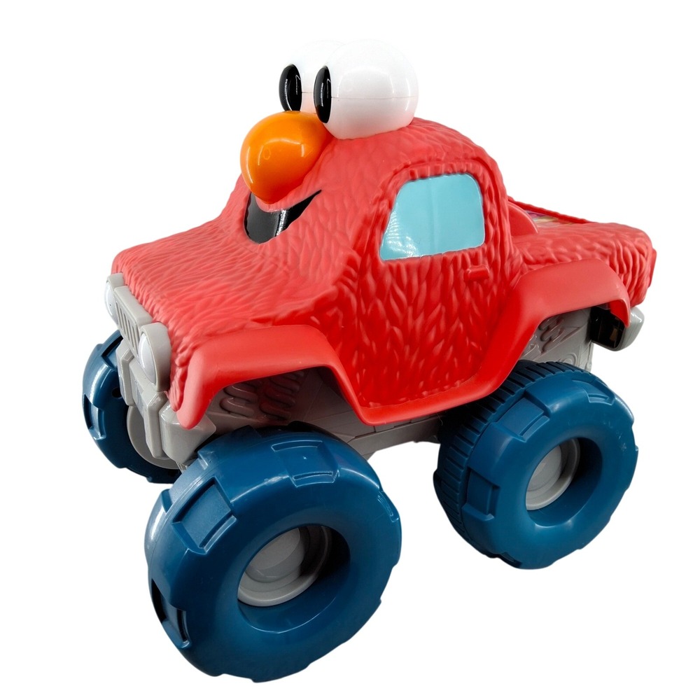 Sesame Street Elmo Giggle N Go Monster Truck Toy Vehicle Sings Pops Wheelie 2+
